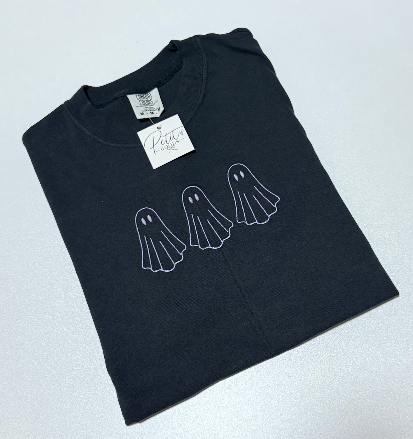 Black embroidered shirt with three ghosts design