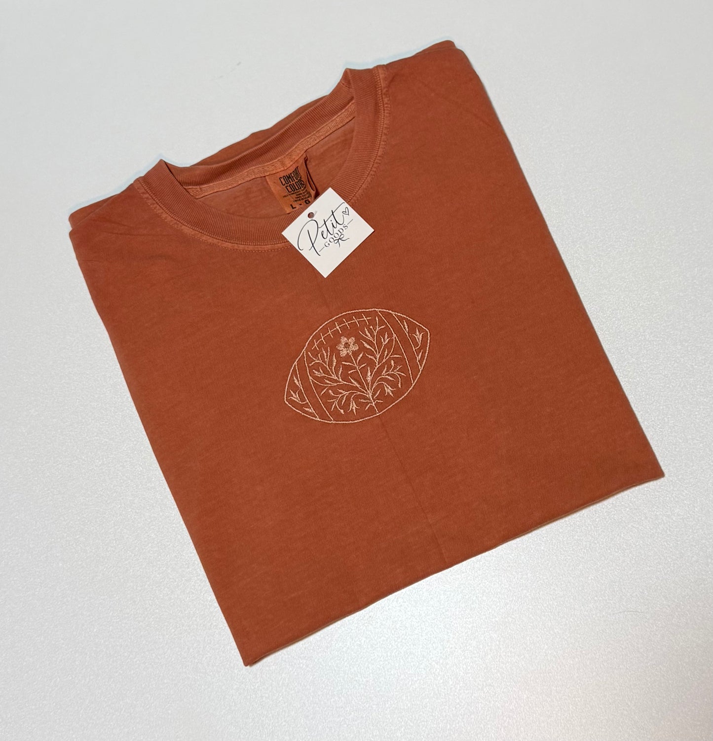Yam embroidered tee with floral football design